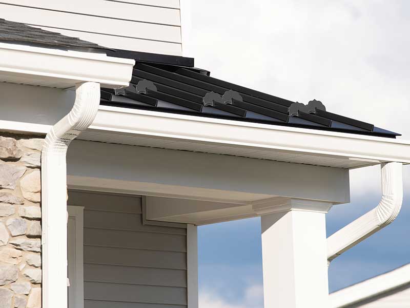 White, k-style gutters with downspouts